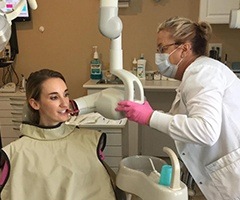 Woman receiving dental x-rays