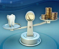 A scale holding a tooth on one end and money on the other