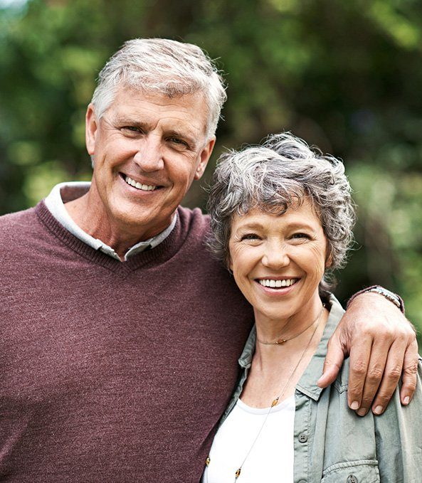 Smiling senior cuple outdoors