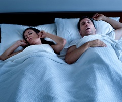 couple sleeping snoring