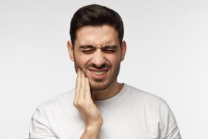 Man with tooth pain.